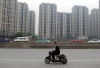 杭州楼市调控购房人涌向周边，海宁新房价同比上涨55.1%