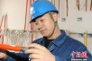 “北疆工匠”许政超:27年坚守带电一线 技术革新32项