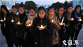南师大举办烛光祭　悼念80年前遇难的南京大屠杀死难者